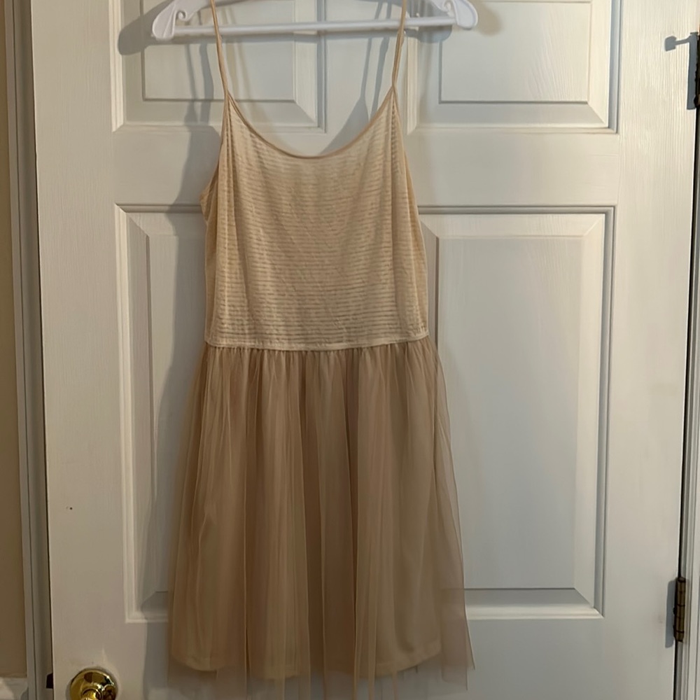 DRESS WITH NET OVER ON BOTTOM.